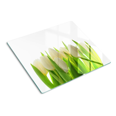 Schneidebrett glas Tulpen vor einem Hintergrund aus grünen Blättern