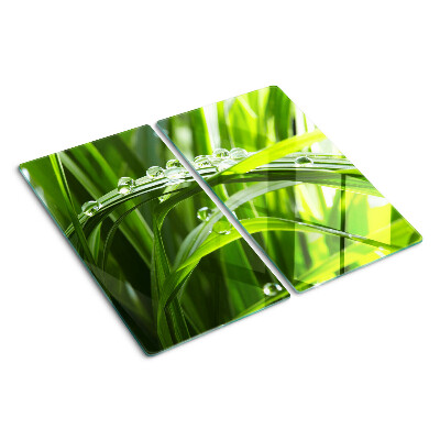 Glasschneidebrett Wassertropfen auf dem Gras