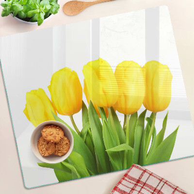 Glasschneidebrett Gelbe Tulpen auf grünem Hintergrund