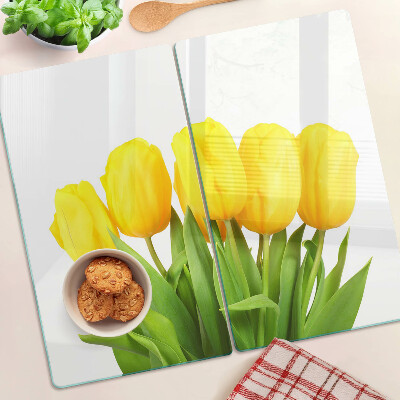Glasschneidebrett Gelbe Tulpen auf grünem Hintergrund