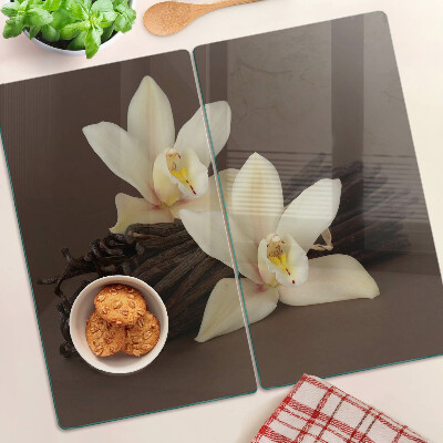 Schneidebrett glas Orchideen und Vanilleschoten