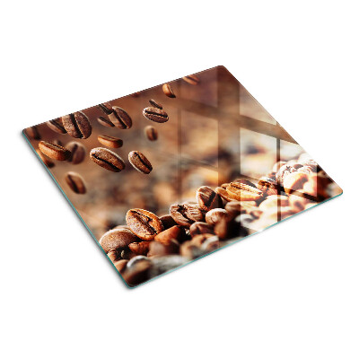Glasschneidebrett Kaffeebohnen in Bewegung