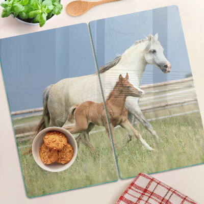 Glasschneidebrett Ein Pferd mit einem Fohlen auf einer Wiese