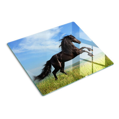 Glasschneidebrett Schwarzes Pferd auf der Wiese