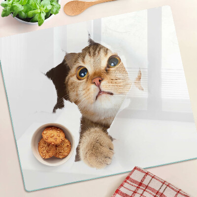 Glasschneidebrett Eine Katze schaut durch ein Loch in der Wand