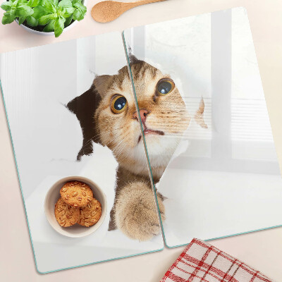 Glasschneidebrett Eine Katze schaut durch ein Loch in der Wand