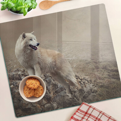 Glasschneidebrett Wolf auf einem felsigen Berg
