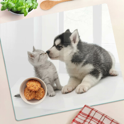 Glasschneidebrett Kätzchen und Welpe in Freundschaft