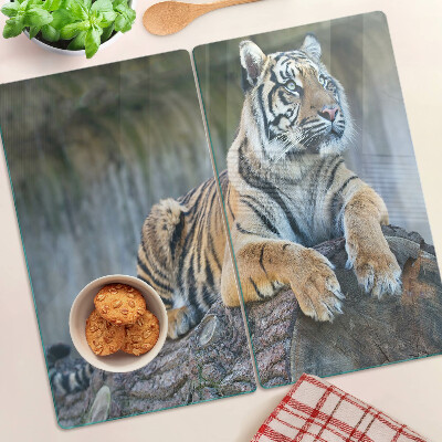 Glasschneidebrett Tiger auf einem Baumstamm