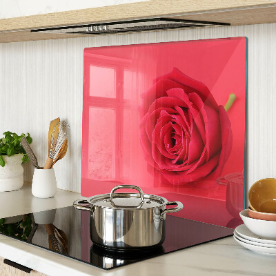 Schneidebrett glas Rote Rose auf dem Hintergrund