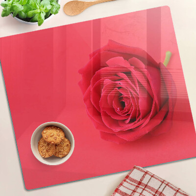 Schneidebrett glas Rote Rose auf dem Hintergrund