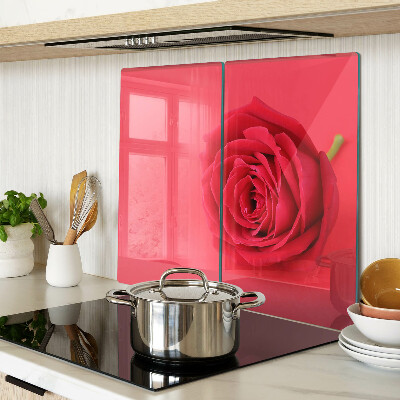 Schneidebrett glas Rote Rose auf dem Hintergrund