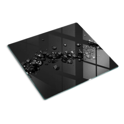 Glasschneidebrett Schwarze Kristalle auf dem Hintergrund