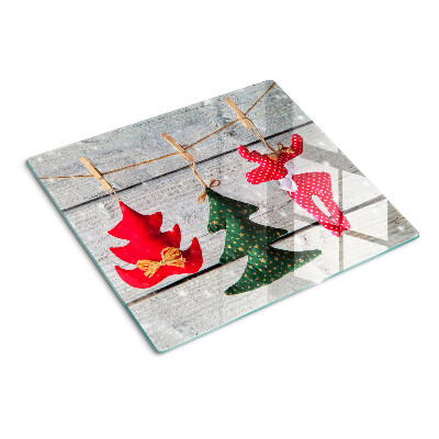 Schneidebrett glas Weihnachtsdekorationen auf einem hölzernen Hintergrund