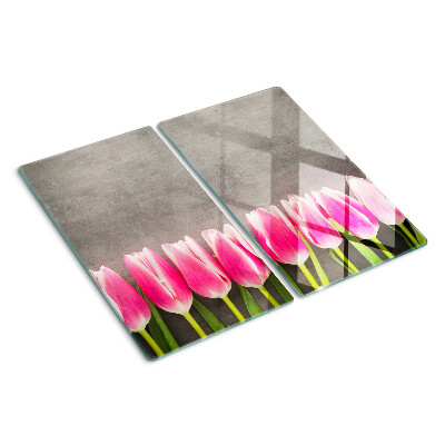 Schneidebrett glas Tulpen auf grauem Hintergrund