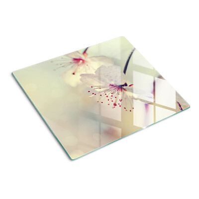 Glasschneidebrett Blumen auf geometrischem Hintergrund