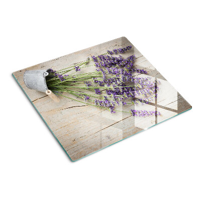 Schneidebrett glas Lavendel in einem Topf auf einem hölzernen Hintergrund