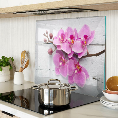 Schneidebrett glas Orchideen auf weißem Hintergrund
