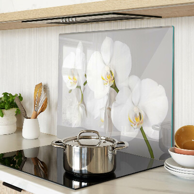 Schneidebrett glas Orchideen auf einem Spiegelhintergrund