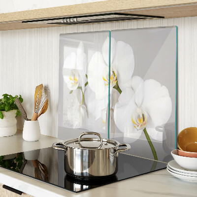 Schneidebrett glas Orchideen auf einem Spiegelhintergrund