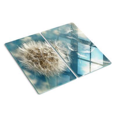 Glasschneidebrett Löwenzahn gegen den Himmel