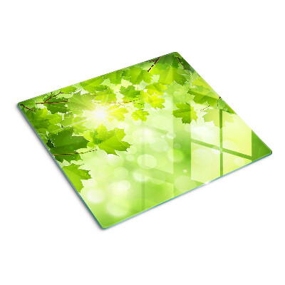 Glasschneidebrett Blätter in den Sonnenstrahlen