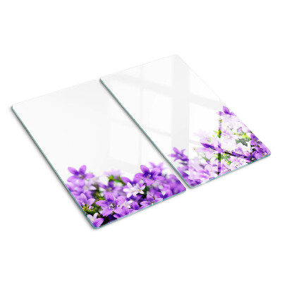 Glasschneidebrett Lila Blumen im Hintergrund