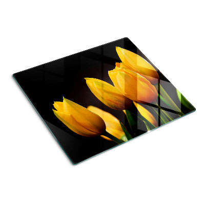 Glasschneidebrett Gelbe Tulpen auf schwarzem Hintergrund