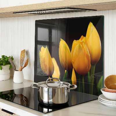 Glasschneidebrett Gelbe Tulpen auf schwarzem Hintergrund