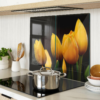Glasschneidebrett Gelbe Tulpen auf schwarzem Hintergrund