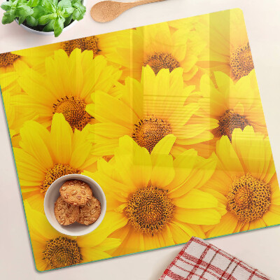 Schneidebrett glas Sonnenblumen auf gelbem Hintergrund