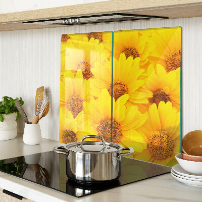 Schneidebrett glas Sonnenblumen auf gelbem Hintergrund