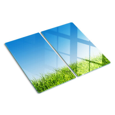 Glasschneidebrett Grüne Wiese unter blauem Himmel