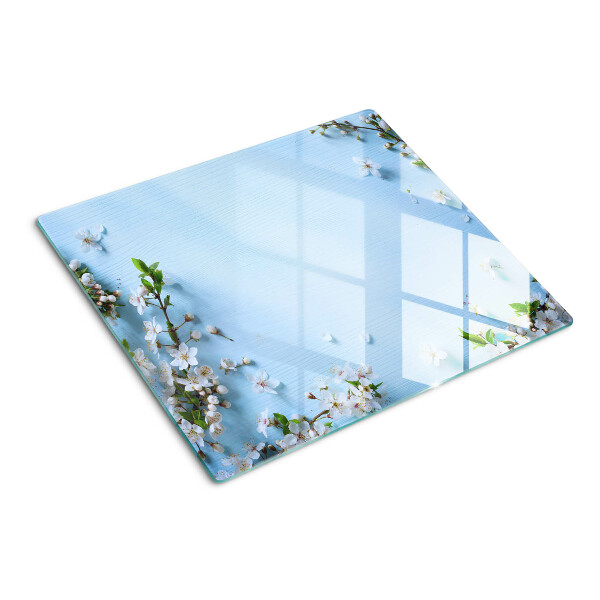 Schneidebrett glas Blumenmuster auf blauem Hintergrund