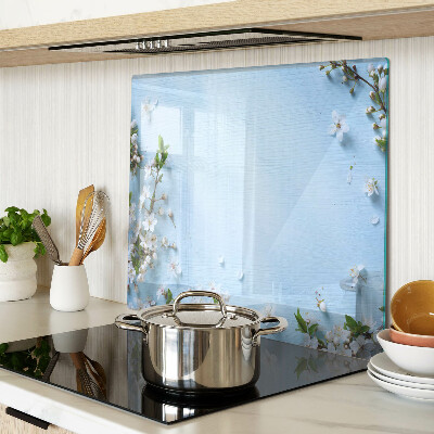 Schneidebrett glas Blumenmuster auf blauem Hintergrund