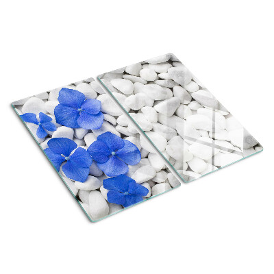 Schneidebrett glas Blaue Blumen auf weißen Steinen