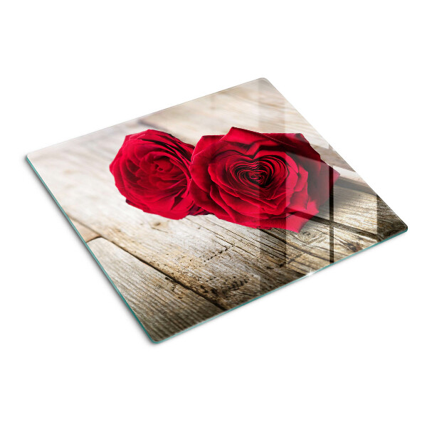 Glasschneidebrett Rote Rosen auf einem hölzernen Hintergrund