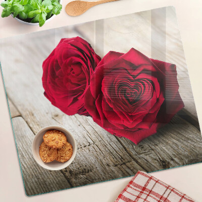 Glasschneidebrett Rote Rosen auf einem hölzernen Hintergrund