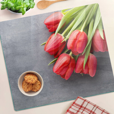 Glasschneidebrett Tulpen auf grauem Hintergrund