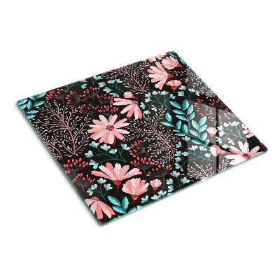 Schneidebrett glas Blumenmuster auf dunklem Hintergrund