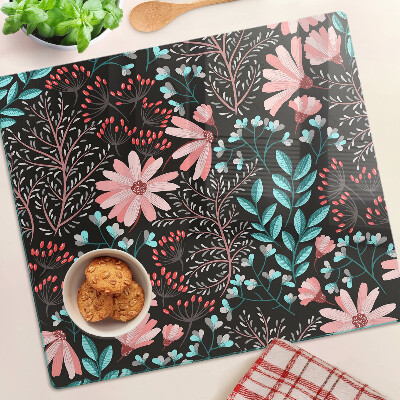 Schneidebrett glas Blumenmuster auf dunklem Hintergrund