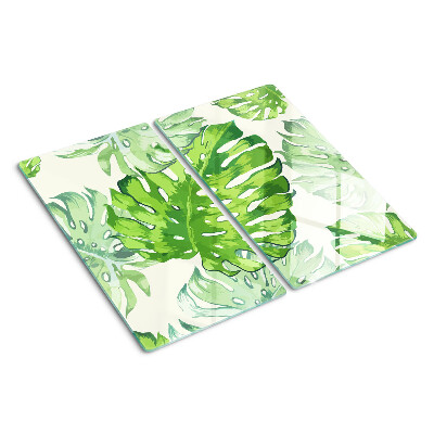 Glasschneidebrett Monstera-Blätter auf hellem Hintergrund