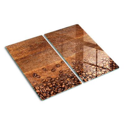 Schneidebrett glas Kaffeebohnen auf Holzhintergrund