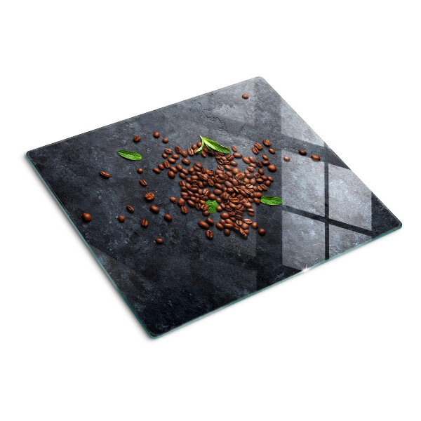 Schneidebrett glas Kaffeebohnen auf einem Steinhintergrund