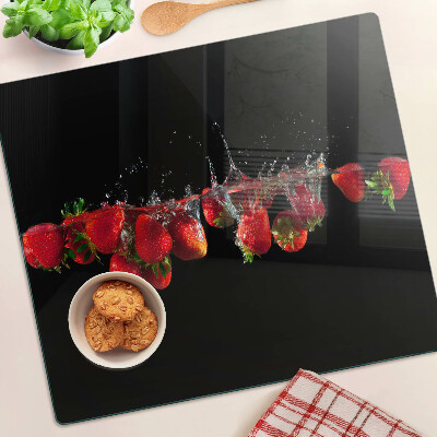 Schneidebrett glas Erdbeeren im Wasser