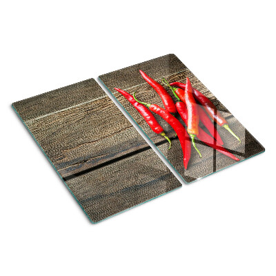 Schneidebrett glas Chilischoten auf einem hölzernen Hintergrund