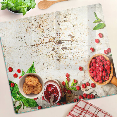 Glasschneidebrett Himbeeren und Blätter