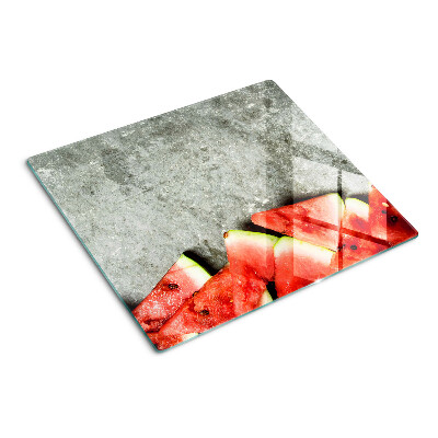 Glasschneidebrett Wassermelonenscheiben auf grauem Hintergrund