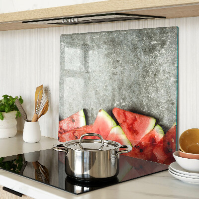 Glasschneidebrett Wassermelonenscheiben auf grauem Hintergrund