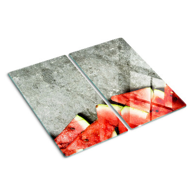 Glasschneidebrett Wassermelonenscheiben auf grauem Hintergrund